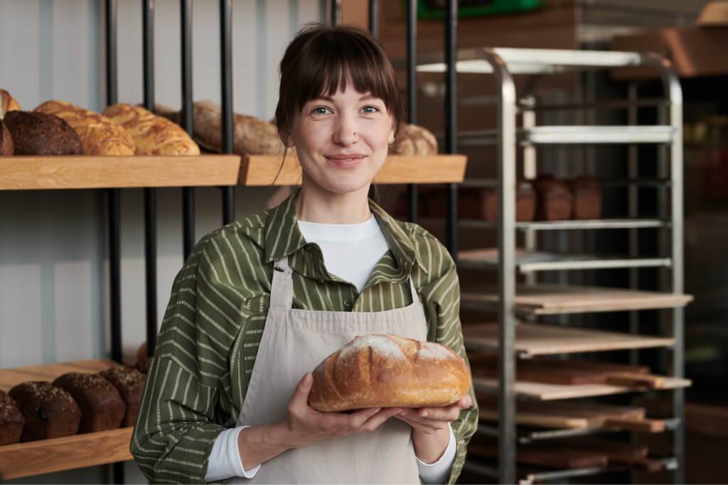 woman with fresh bread in the shop 2021 09 02 21 45 16 utc 2